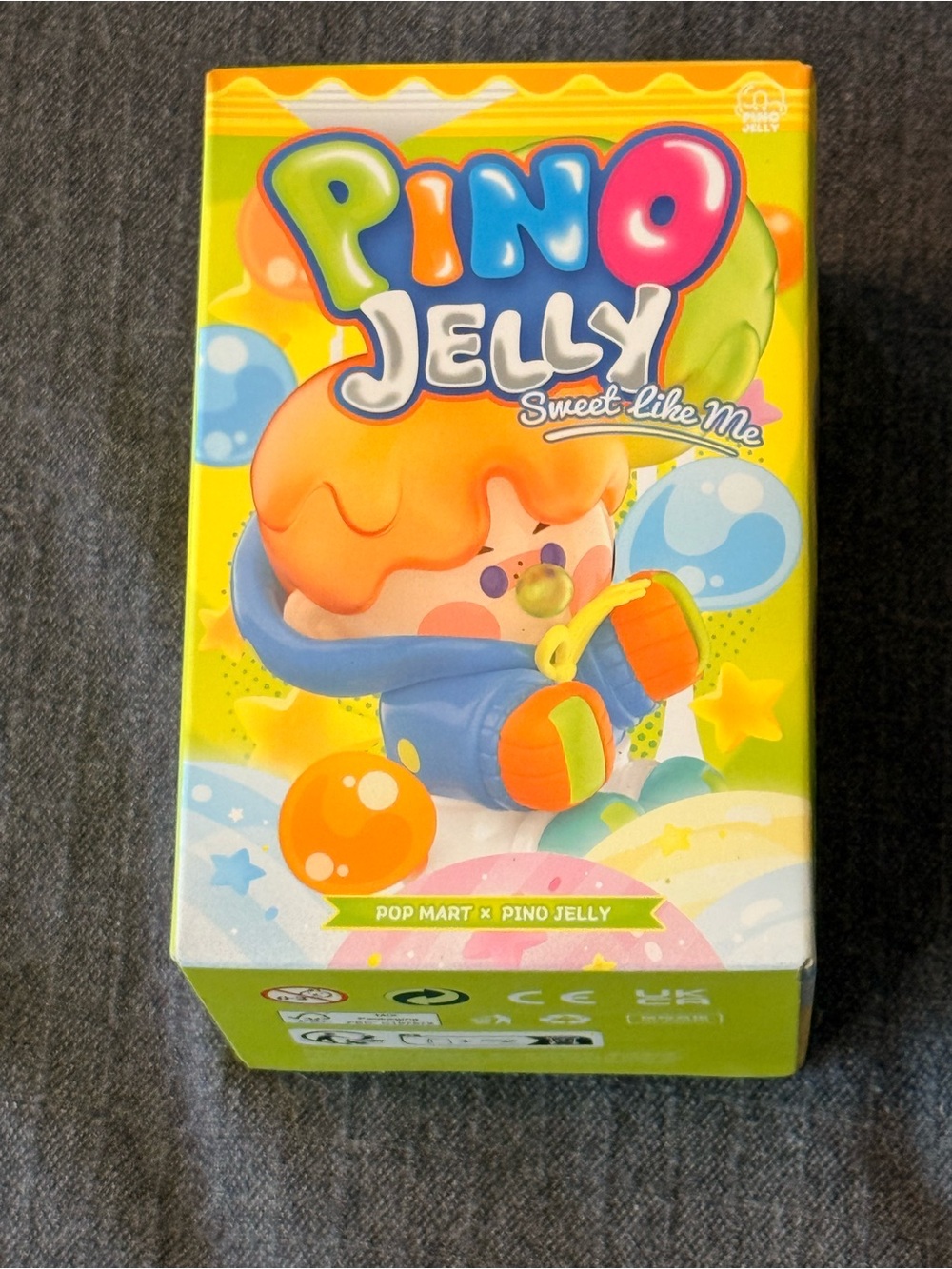 POP MART Pino Jelly Collectible Figure - Yellow, Orange & Blue